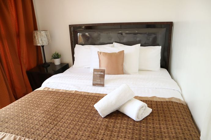 Imagen de la habitación del Hotel Sea Pearl Manila Suites. Foto 16