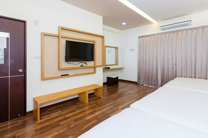 Imagen de la habitación del Hotel Sea Sky Coast Homestay. Foto 17