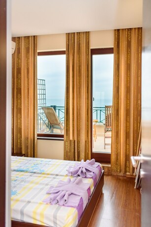 Imagen de la habitación del Hotel Sea View Rental Front Beach. Foto 37