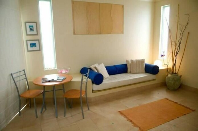 Imagen de la habitación del Hotel Sea and Soul Beachside Studios. Foto 7