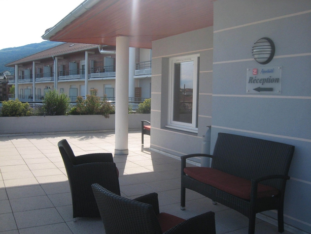 Imagen de los exteriores del Hotel Séjours Et Affaires Les Rives Du Leman - Gex. Foto 11