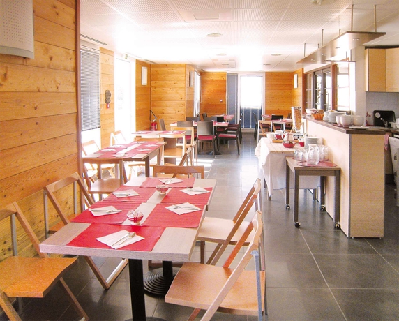 Imagen del bar/restaurante del Hotel Séjours Et Affaires Les Rives Du Leman - Gex. Foto 4