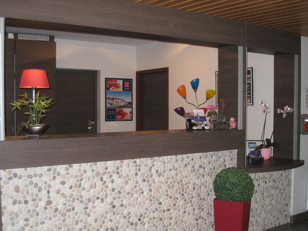 Imagen de los interiores del Hotel Séjours Et Affaires Les Rives Du Leman - Gex. Foto 15