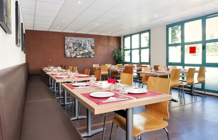 Imagen del bar/restaurante del Hotel Séjours & Affaires Rive Gauche - Serris. Foto 1