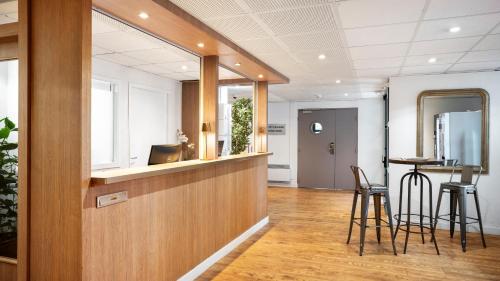 Imagen de los interiores del Hotel S&eacute;jours & Affaires Rive Gauche - Serris. Foto 9