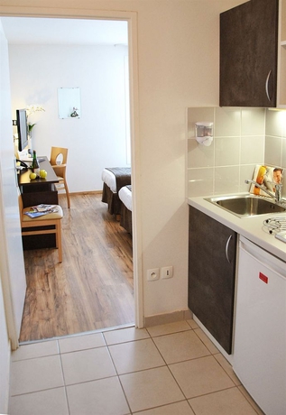 Imagen de la habitación del Hotel Séjours and Affaires Caen Le Clos Beaumois. Foto 4