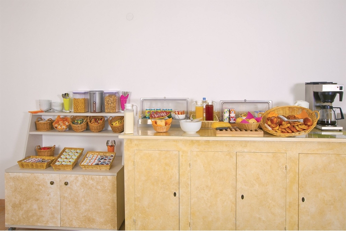 Imagen del bar/restaurante del Hotel Séjours and Affaires Lyon Saint-nicolas. Foto 2