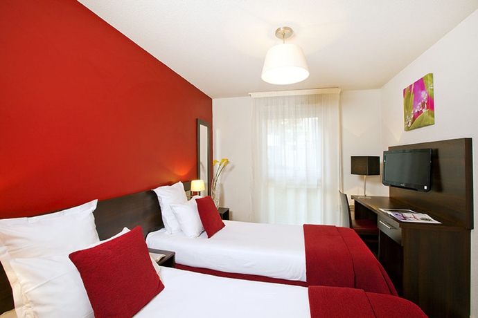Imagen de la habitación del Hotel Séjours and Affaires Paris Malakoff. Foto 12