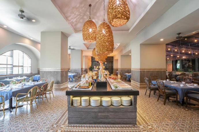 Imagen del bar/restaurante del Hotel Seadust Cancun All Inclusive Family Resort. Foto 2