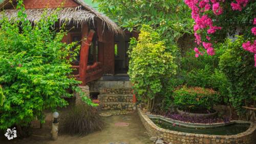 Imagen de la habitación del Hotel Seaflower Bungalows. Foto 2