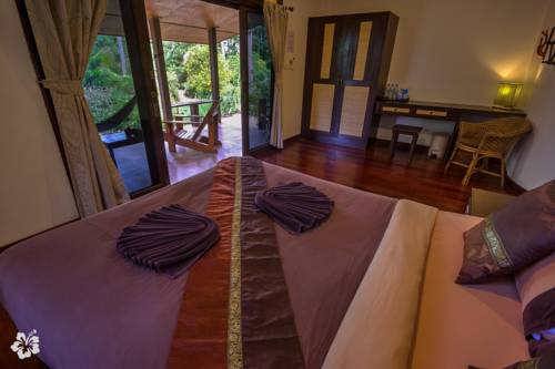 Imagen de la habitación del Hotel Seaflower Bungalows. Foto 3