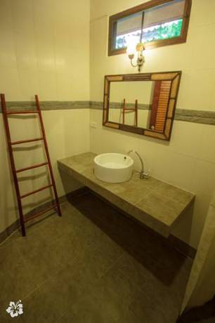 Imagen de la habitación del Hotel Seaflower Bungalows. Foto 4