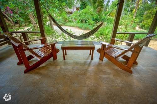 Imagen de la habitación del Hotel Seaflower Bungalows. Foto 6