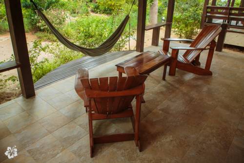 Imagen de la habitación del Hotel Seaflower Bungalows. Foto 7