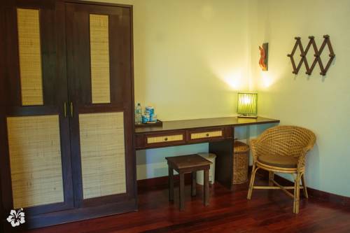 Imagen de la habitación del Hotel Seaflower Bungalows. Foto 8
