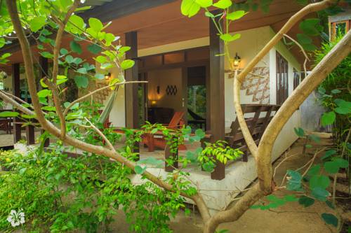 Imagen de la habitación del Hotel Seaflower Bungalows. Foto 9