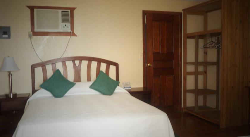 Imagen de la habitación del Hotel Seagrape Plantation Resort. Foto 2