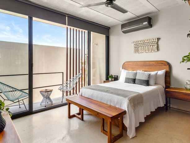Imagen de la habitación del Hotel Searena Boutique Condo. Foto 8