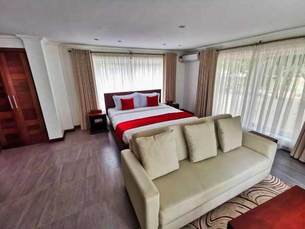 Imagen de la habitación del Hotel Searenity Beach Villa. Foto 17