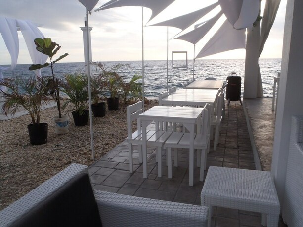 Imagen del bar/restaurante del Hotel Seascape Resort Oslob. Foto 22