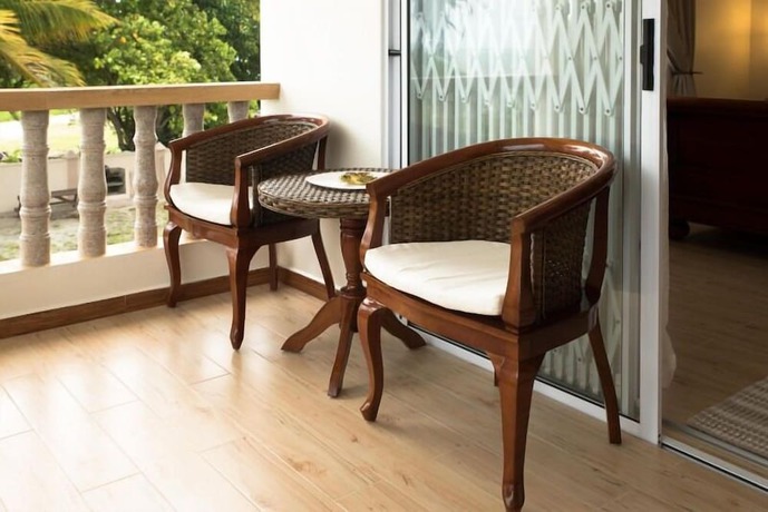 Imagen de la habitación del Hotel Seashell Beach Villa. Foto 10