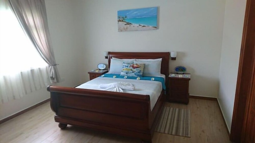 Imagen de la habitación del Hotel Seashell Beach Villa. Foto 12
