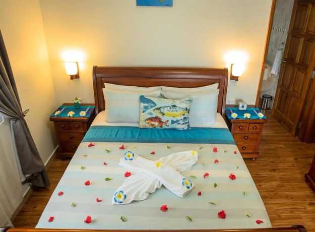 Imagen de la habitación del Hotel Seashell Beach Villa. Foto 14