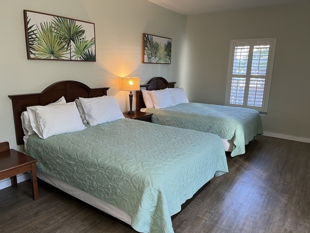 Imagen de la habitación del Hotel Seashell Village Resort near the beach with kitchens. Foto 4