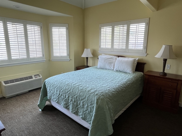 Imagen de la habitación del Hotel Seashell Village Resort near the beach with kitchens. Foto 6