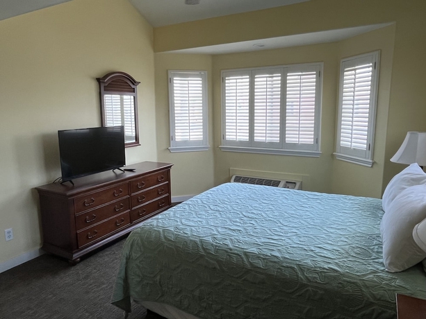 Imagen de la habitación del Hotel Seashell Village Resort near the beach with kitchens. Foto 7