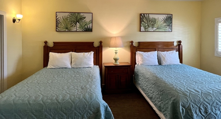 Imagen de la habitación del Hotel Seashell Village Resort near the beach with kitchens. Foto 8