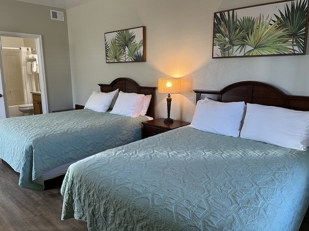 Imagen de la habitación del Hotel Seashell Village Resort near the beach with kitchens. Foto 14