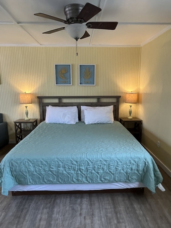 Imagen de la habitación del Hotel Seashell Village Resort near the beach with kitchens. Foto 16