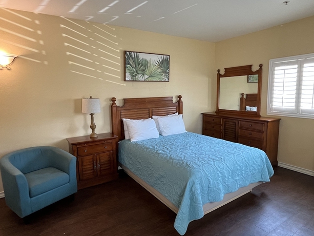 Imagen de la habitación del Hotel Seashell Village Resort near the beach with kitchens. Foto 18