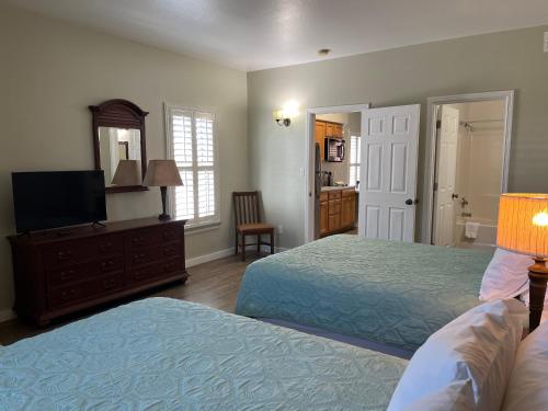 Imagen de la habitación del Hotel Seashell Village Resort near the beach with kitchens. Foto 18