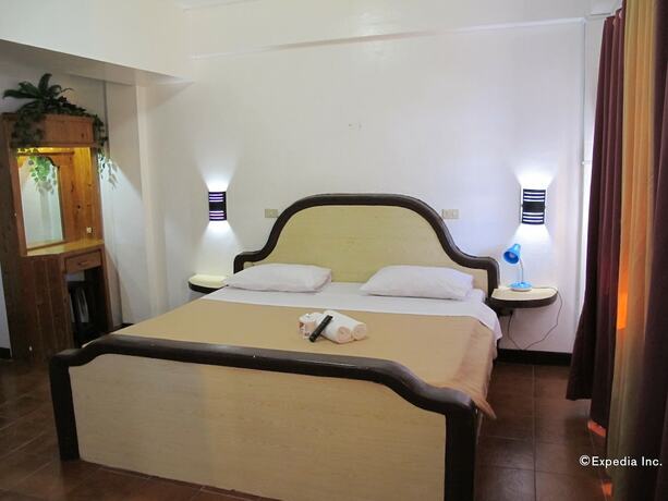 Imagen de la habitación del Hotel Seashore Beach Resort. Foto 19