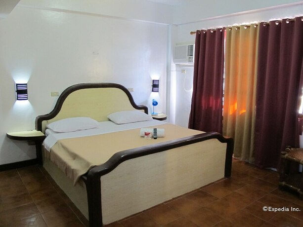 Imagen de la habitación del Hotel Seashore Beach Resort. Foto 20