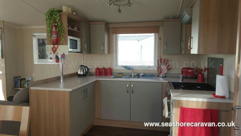 Imagen de la habitación del Hotel Seashore Caravan. Foto 13