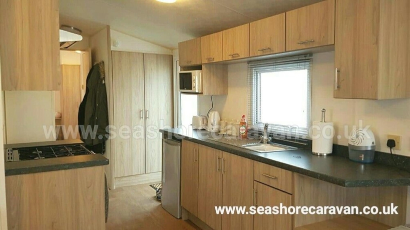 Imagen de la habitación del Hotel Seashore Caravan. Foto 19