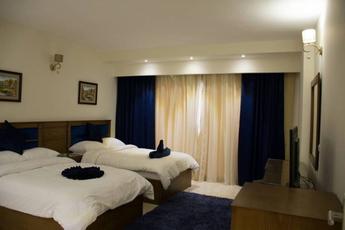 Imagen de la habitación del Hotel Seashore Homes. Foto 8
