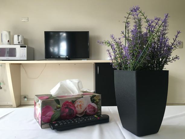 Imagen de la habitación del Hotel Seaside Garden Retreat. Foto 11