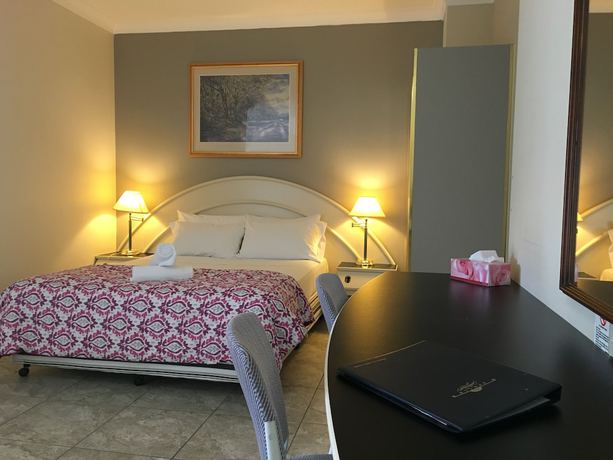 Imagen de la habitación del Hotel Seaside Garden Retreat. Foto 15