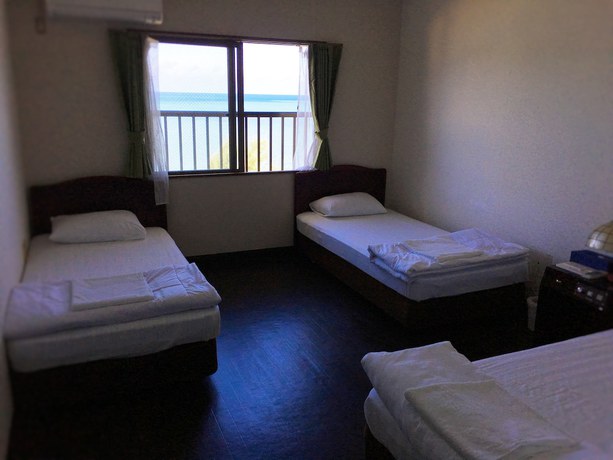 Imagen de la habitación del Hotel Seaside Hotel Blue Moon. Foto 11