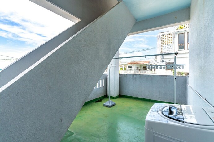 Imagen de la habitación del Hotel Seaside Motobu. Foto 17
