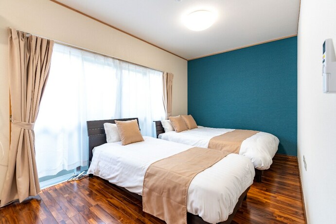 Imagen de la habitación del Hotel Seaside Motobu. Foto 21