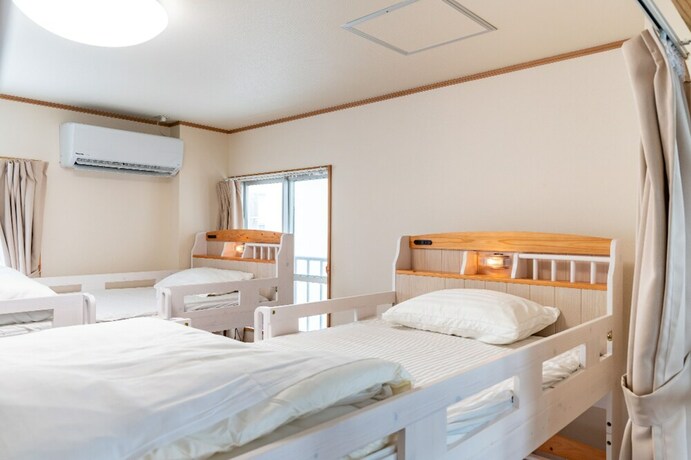 Imagen de la habitación del Hotel Seaside Motobu. Foto 24