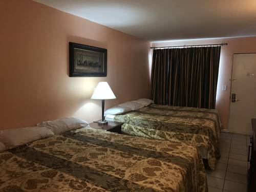 Imagen de la habitación del Hotel Seaside Sands Inn. Foto 6