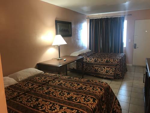 Imagen de la habitación del Hotel Seaside Sands Inn. Foto 8