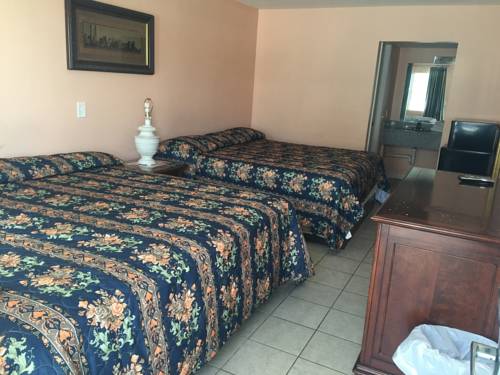 Imagen de la habitación del Hotel Seaside Sands Inn. Foto 9