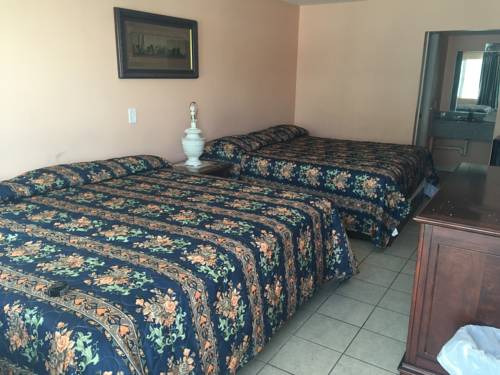 Imagen de la habitación del Hotel Seaside Sands Inn. Foto 11